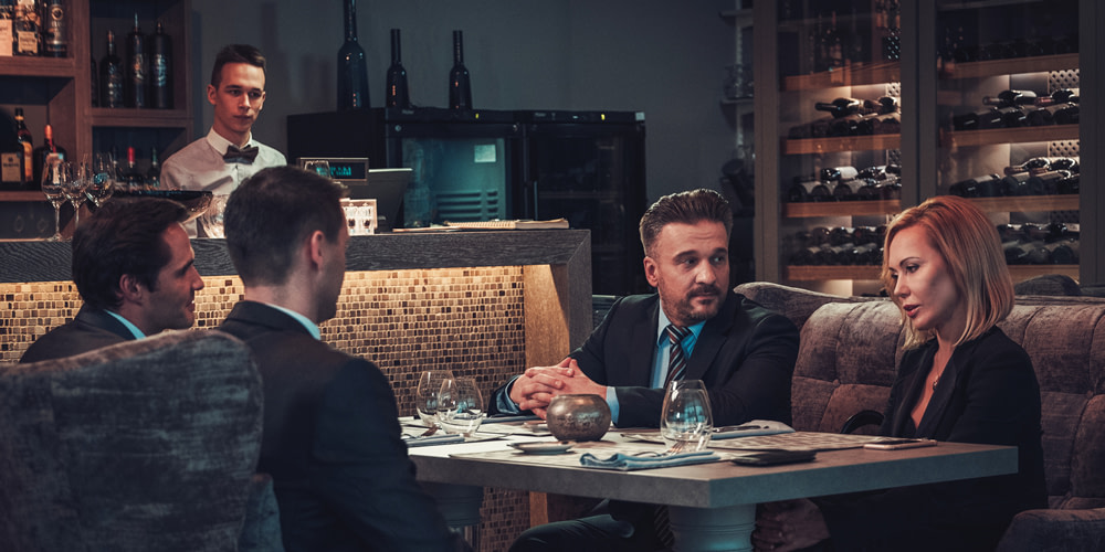 A communication divulged to “strangers” or outsiders can scarcely be considered a confidential communication between attorney and client.